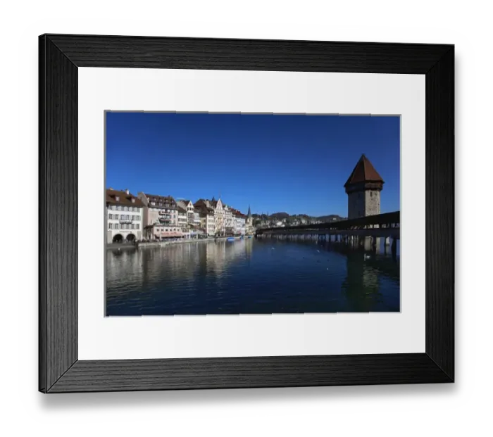 Framed Print : Kapelbrucke or Chapel Bridge, spanning the Reuss River diagonally from St. Peter s Framed Print : Kapelbrucke or Chapel Bridge, spanning the Reuss River diagonally from St. Peter s