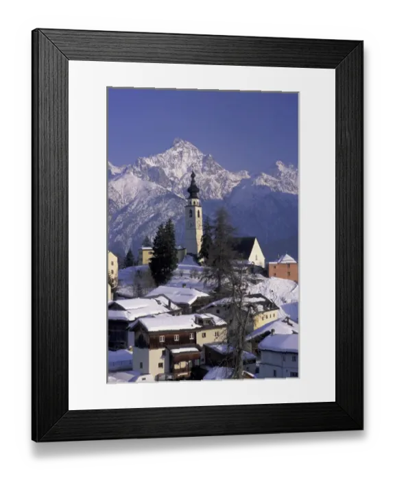 Framed Print : Europe, Switzerland, Graubunden, Ftan Village. Winter afternoon in town with Unterengradin Framed Print : Europe, Switzerland, Graubunden, Ftan Village. Winter afternoon in town with Unterengradin