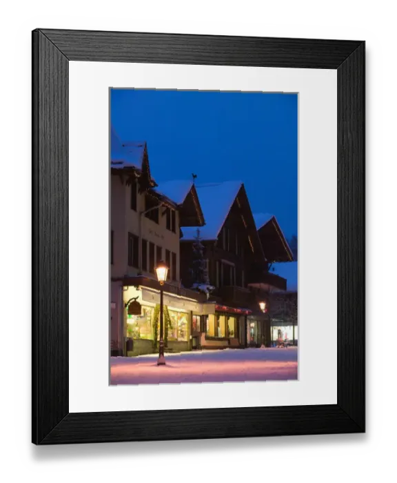 Framed Print : SWITZERLAND-Bern-GSTaD: Town Shops / Evening / Winter Framed Print : SWITZERLAND-Bern-GSTaD: Town Shops / Evening / Winter