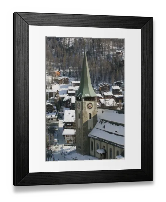 Framed Print : SWITZERLAND-Wallis  /  Valais-ZERMATT: Town Parish Church  /  Daytime  /  Winter