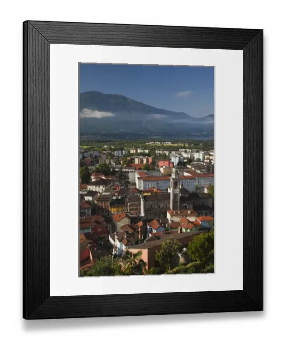 Framed Print : SWITZERLAND, Ticino Canton, Locarno. High angle town view, morning Framed Print : SWITZERLAND, Ticino Canton, Locarno. High angle town view, morning