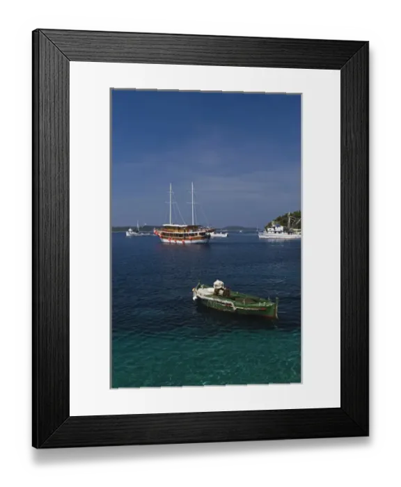 Framed Print : Boats docked in harbor, Hvar Island, Croatia