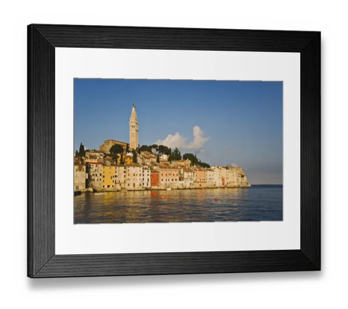 Framed Print : Rovigno skyline and Cathedral of St. Euphemia reflected on Adriatic Sea at sunrise
