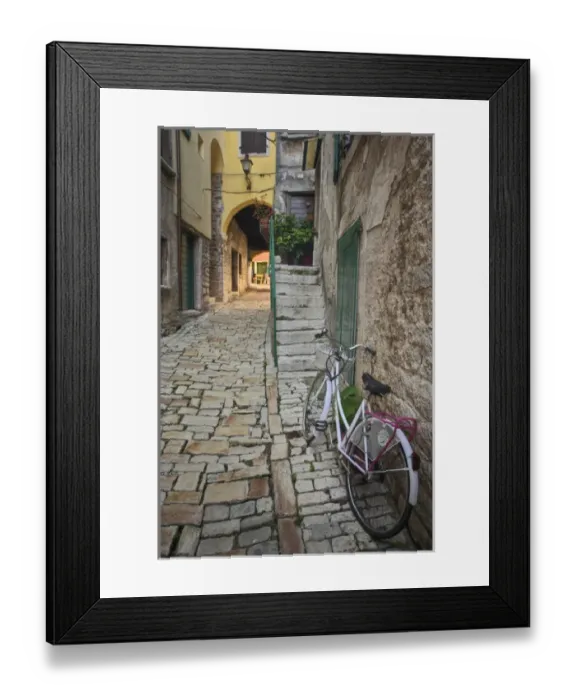 Framed Print : Bicycle and colorful cobblestone alleyway framed by arch, Rovigno, Croatia Framed Print : Bicycle and colorful cobblestone alleyway framed by arch, Rovigno, Croatia
