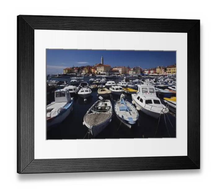 Framed Print : Boats docked in harbor in front of distant Cathedral of St. Euphemia, Rovigno, Croatia Framed Print : Boats docked in harbor in front of distant Cathedral of St. Euphemia, Rovigno, Croatia