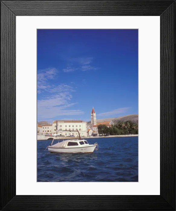 Framed Print : The Cathedral of Saint Lovro in Trogir stands behind a small boat in the Trogir Canal Framed Print : The Cathedral of Saint Lovro in Trogir stands behind a small boat in the Trogir Canal