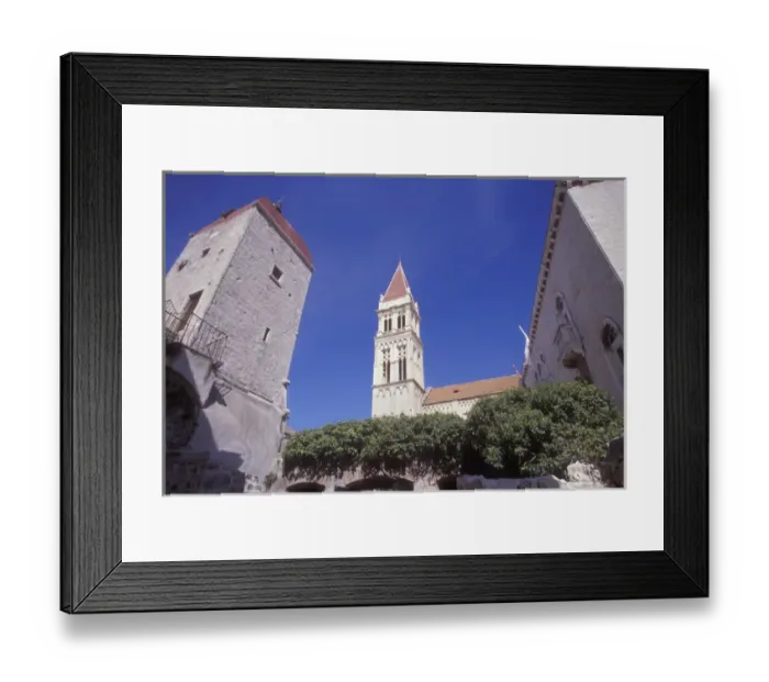 Framed Print : The belltower of the Cathedral of Saint Lobro is surrounded by other nearby buildings Framed Print : The belltower of the Cathedral of Saint Lobro is surrounded by other nearby buildings