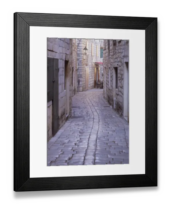 Framed Print : Narrow cobbled roadway in a residential area of Stari Grad. Hvar Island. Croatia Framed Print : Narrow cobbled roadway in a residential area of Stari Grad. Hvar Island. Croatia