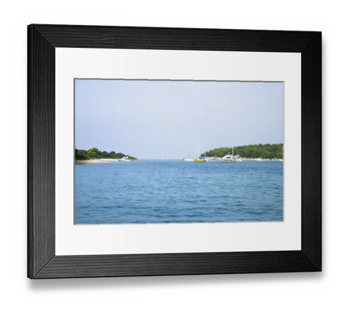 Framed Print : Cres, Coatia - Boats floating in an ocean inlet. Horizontal shot Framed Print : Cres, Coatia - Boats floating in an ocean inlet. Horizontal shot