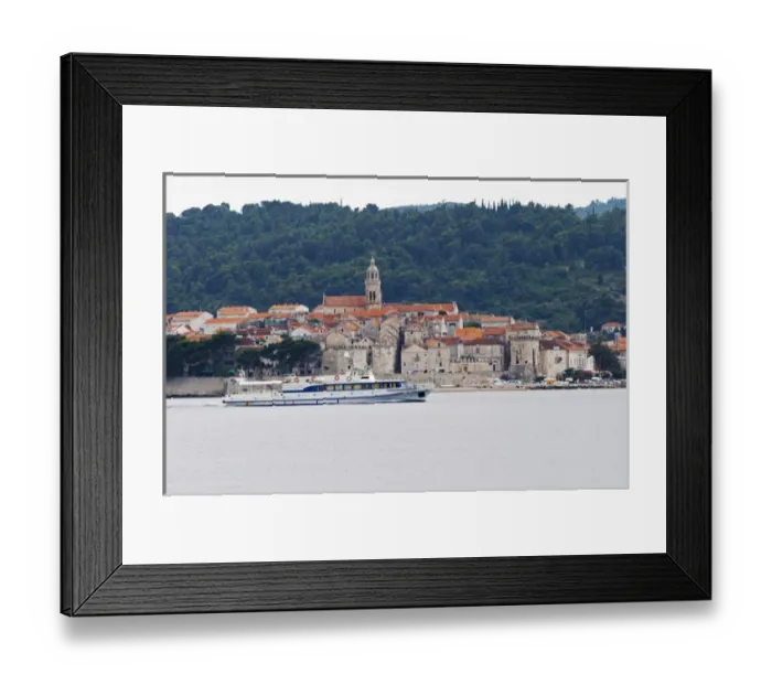 Framed Print : View across the sea on the town of Korcula on the island of the same name where Marco Polo was born