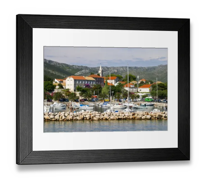 Framed Print : The pleasure boat harbour and the village. Orebic town, holiday resort on the south