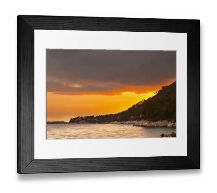 Framed Print : The Brna bay at sunset, bright orange sky, sky reflected in the sea water. Holiday Framed Print : The Brna bay at sunset, bright orange sky, sky reflected in the sea water. Holiday