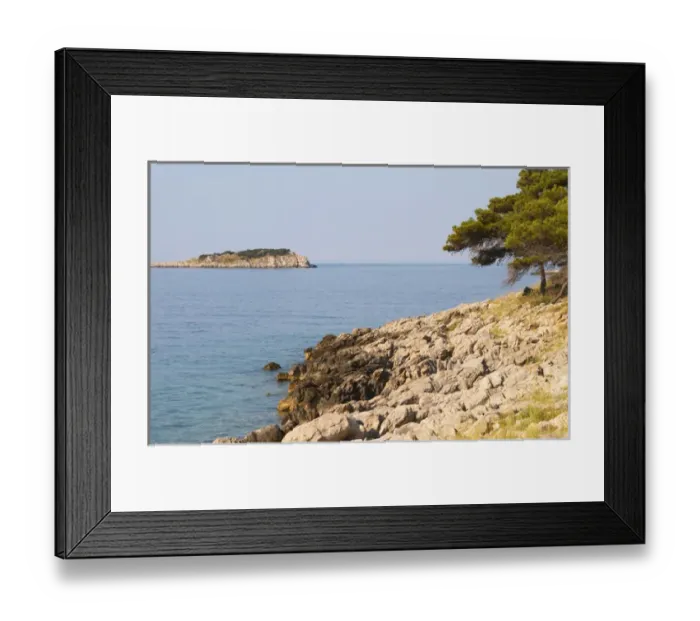 Framed Print : View over coast cliffs with pine trees over the sea water towards an island. Prizba village Framed Print : View over coast cliffs with pine trees over the sea water towards an island. Prizba village