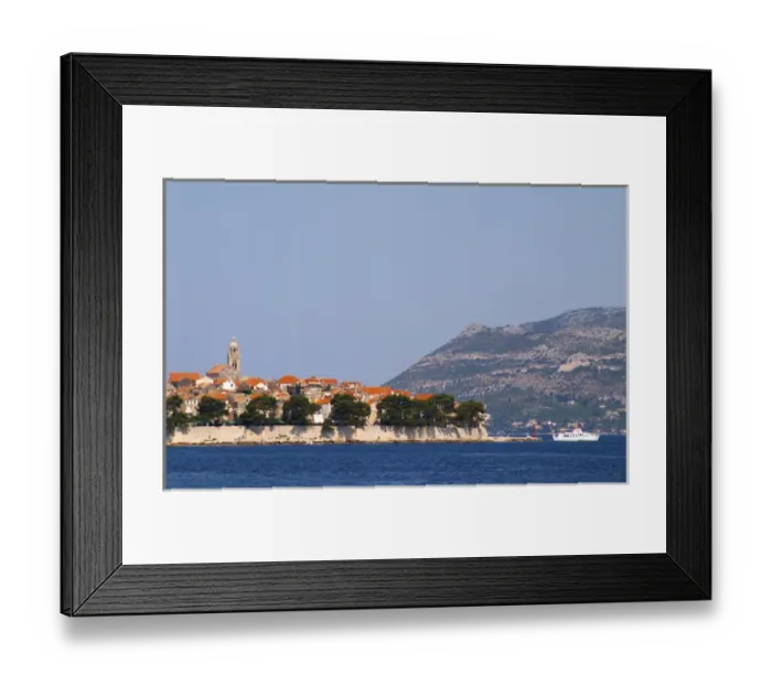 Framed Print : View across the sea on the town of Korcula on the island of the same name where Marco Framed Print : View across the sea on the town of Korcula on the island of the same name where Marco