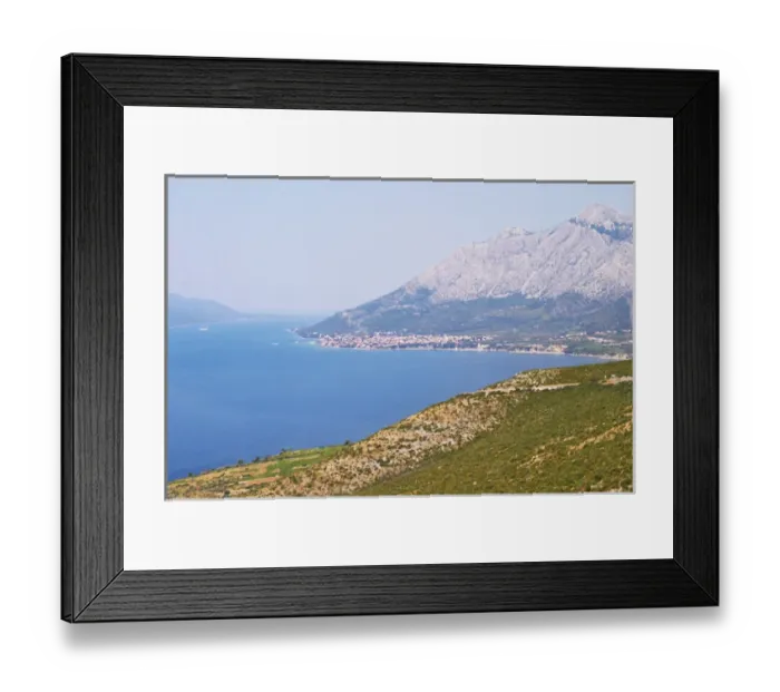 Framed Print : View over the Orebic village town and the Sveti Ilija mountain, dark blue sea towards Framed Print : View over the Orebic village town and the Sveti Ilija mountain, dark blue sea towards