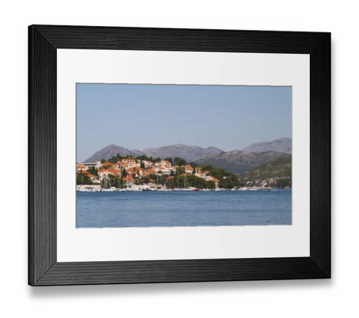 Framed Print : Pleasure boats moored on buoys and along the key. Mountain tops in the background Framed Print : Pleasure boats moored on buoys and along the key. Mountain tops in the background