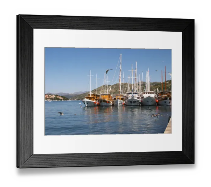 Framed Print : A row of beautiful wooden cruising, sailing and fishing boats ships yachts painted Framed Print : A row of beautiful wooden cruising, sailing and fishing boats ships yachts painted