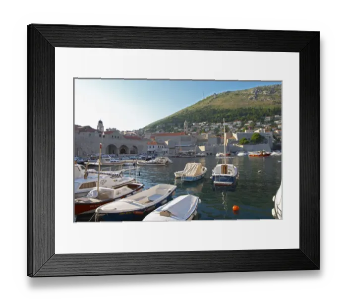 Framed Print : The old harbour with small fishing and pleasure boats. The Arsenal and the SRD hill