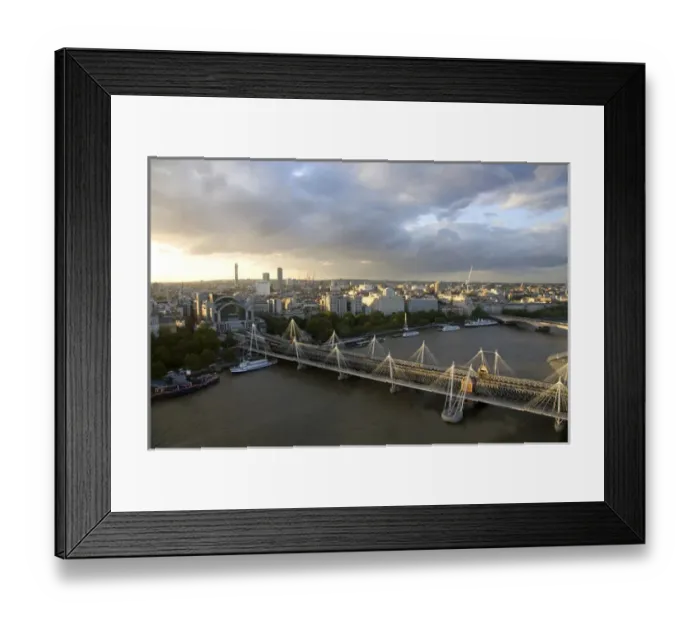Framed Print : Charing Cross railway station at the north end of the Hungerford Bridge and Golden Framed Print : Charing Cross railway station at the north end of the Hungerford Bridge and Golden