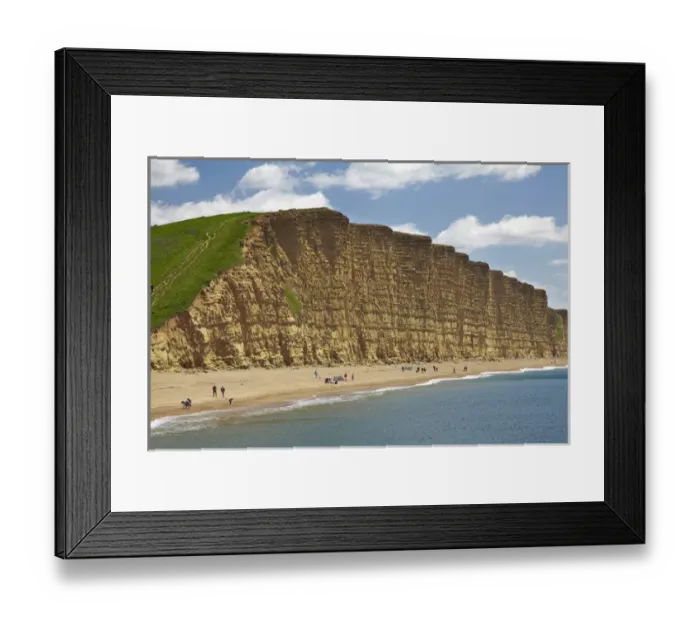 Framed Print : People on beach by West Bay Cliffs, Jurassic Coast World Heritage Site, West Bay Framed Print : People on beach by West Bay Cliffs, Jurassic Coast World Heritage Site, West Bay