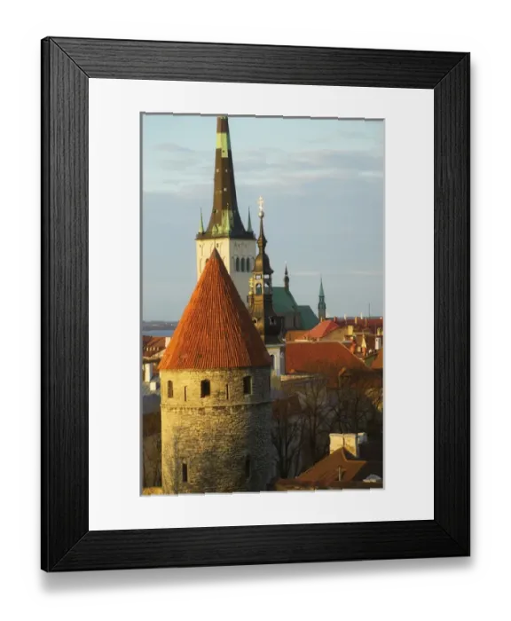 Framed Print : Tallinn cityscape dominated by St. Olafs Church and city wall towers, Estonia Framed Print : Tallinn cityscape dominated by St. Olafs Church and city wall towers, Estonia