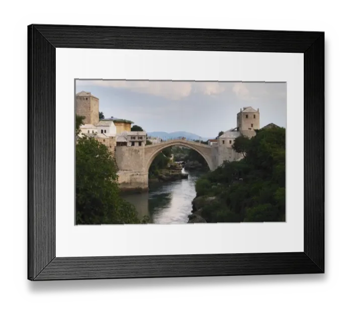 Framed Print : View along the river of the old reconstructed bridge. Historic town of Mostar. Federation Framed Print : View along the river of the old reconstructed bridge. Historic town of Mostar. Federation