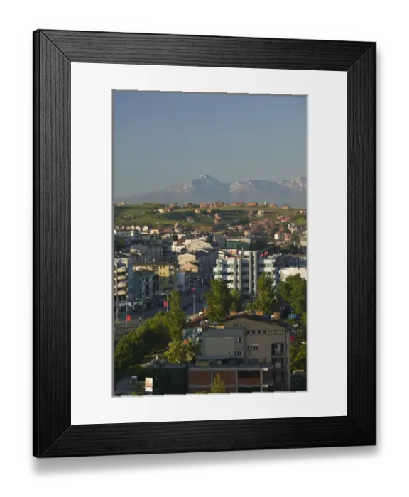 Framed Print : KOSOVO, Prishtina. Downtown Prishtina and the Albanian Mountains to the South / Morning Framed Print : KOSOVO, Prishtina. Downtown Prishtina and the Albanian Mountains to the South / Morning
