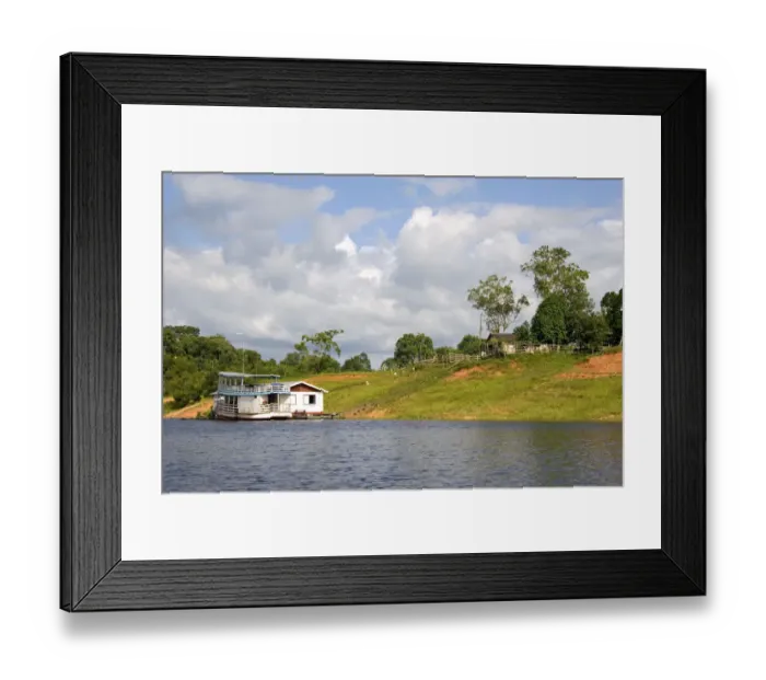 Framed Print : River boat and house on the Arasa River in the Amazon jungle near Manaus, Brazil Framed Print : River boat and house on the Arasa River in the Amazon jungle near Manaus, Brazil