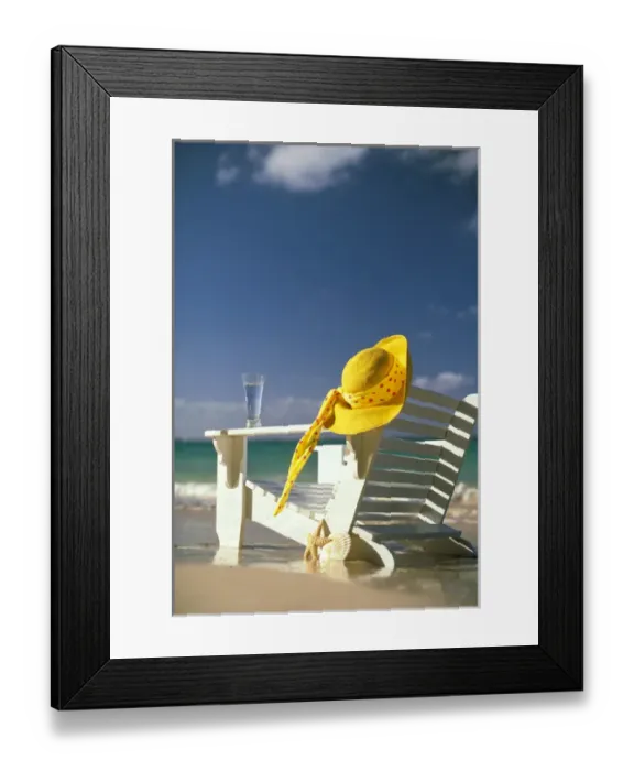 Framed Print : USA, Hawaii. Sun hat and lounge chair on beach Framed Print : USA, Hawaii. Sun hat and lounge chair on beach
