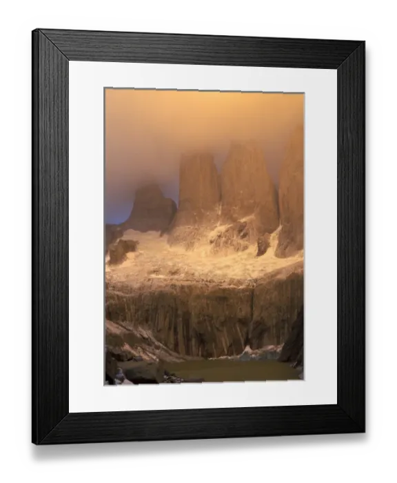 Framed Print : Sunrise glow with clouds at Torres del Paine in the Patagonia region of Chile