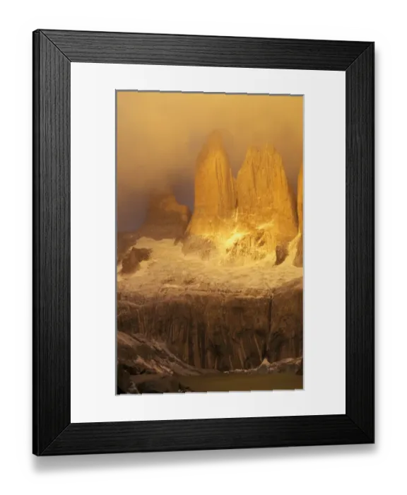 Framed Print : Sunrise with golden clouds on Torres del Paine in Patagonia region of Chile