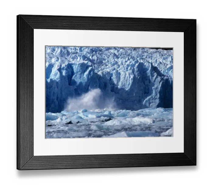 Framed Print : South America, Chile, San Rafael Lagoon NP. A newly-calved iceberg splashes against Framed Print : South America, Chile, San Rafael Lagoon NP. A newly-calved iceberg splashes against