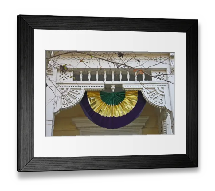Framed Print : USA, Louisiana, New Orleans, Garden District. A Mardi Gras decoration hangs from Victorian fretwork