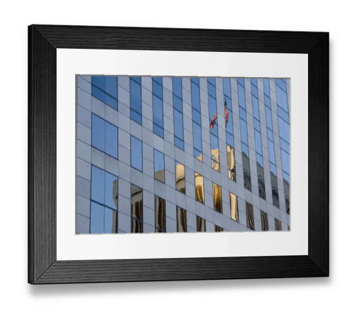 Framed Print : USA, Louisiana, New Orleans. American flag atop building reflected in glass of a skyscraper Framed Print : USA, Louisiana, New Orleans. American flag atop building reflected in glass of a skyscraper