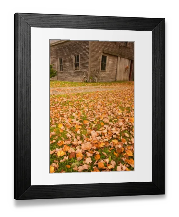 Framed Print : Maine, Old wooden barn with wagon wheels in fall in rural New England Framed Print : Maine, Old wooden barn with wagon wheels in fall in rural New England