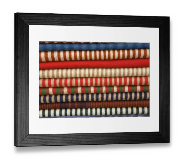 Framed Print : South America, Ecuador, Saquisili, stack of ponchos at weekly food and crafts market