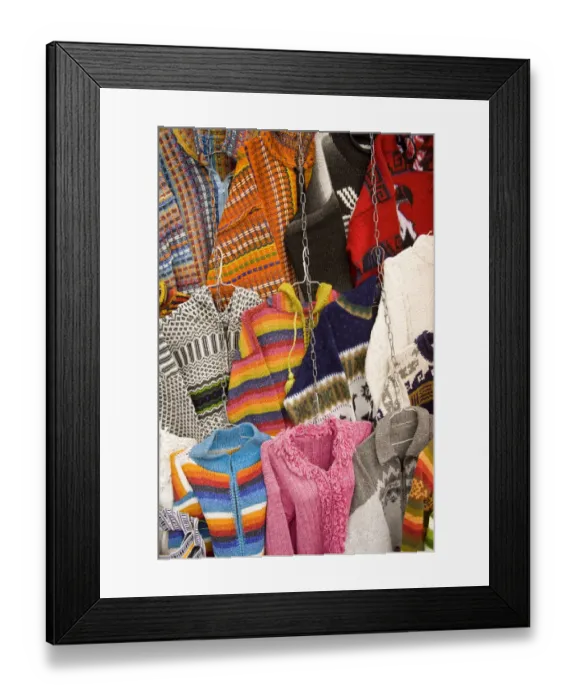 Framed Print : Sweaters and ponchos on display at market, Plaza de San Francisco, Cuenca, Ecuador Framed Print : Sweaters and ponchos on display at market, Plaza de San Francisco, Cuenca, Ecuador
