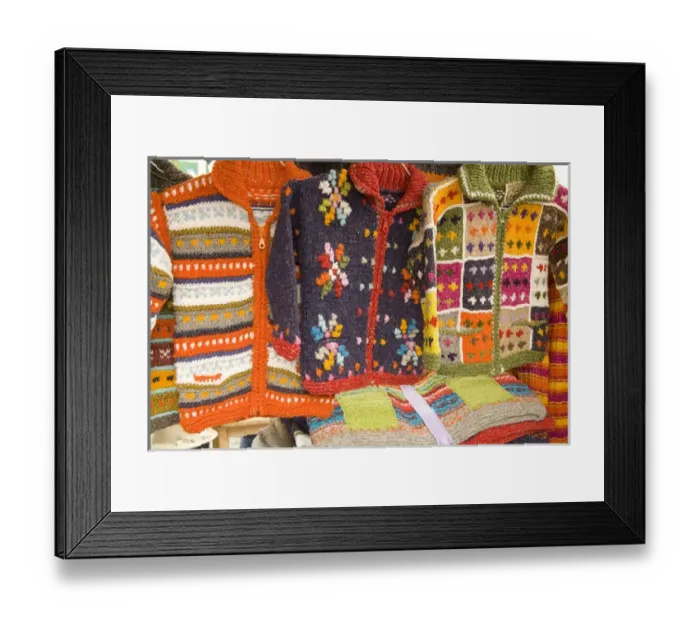 Framed Print : South America, Ecuador, Otavalo, Plaza de Ponchos, sweaters on display at the Saturday textile