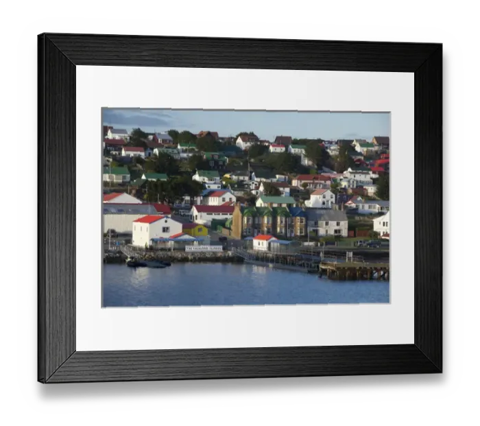 Framed Print : Falkland Island, Stanley (aka Port Stanley). Port area of Stanley in front of typical Framed Print : Falkland Island, Stanley (aka Port Stanley). Port area of Stanley in front of typical