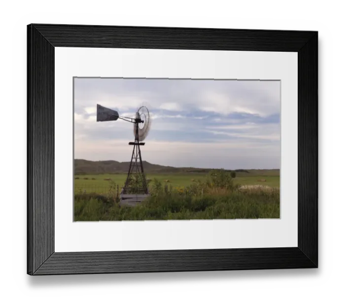 Framed Print : The Nebraska Sandhills is remote, dramatic and wild country dotted with working windmills Framed Print : The Nebraska Sandhills is remote, dramatic and wild country dotted with working windmills