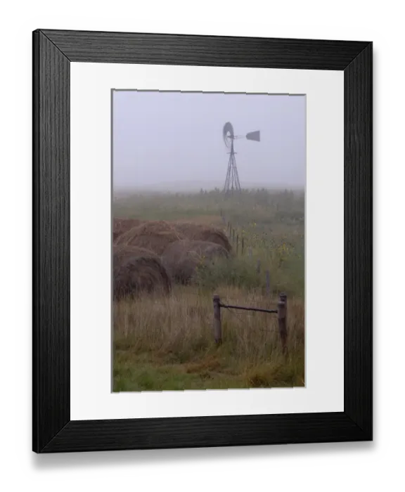 Framed Print : The Nebraska Sandhills is remote, dramatic and wild country dotted with working windmills