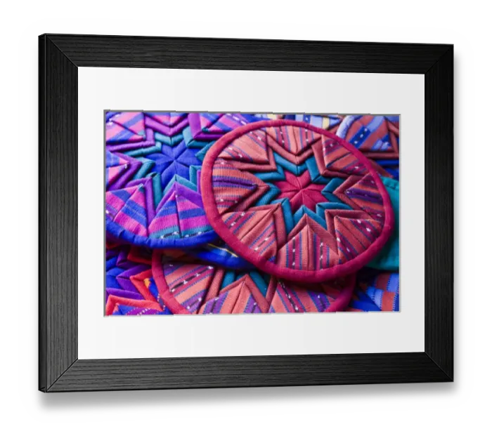 Framed Print : Central America, Guatemala, Antigua. Colorful quilt pieces for sale in shop in Antigua