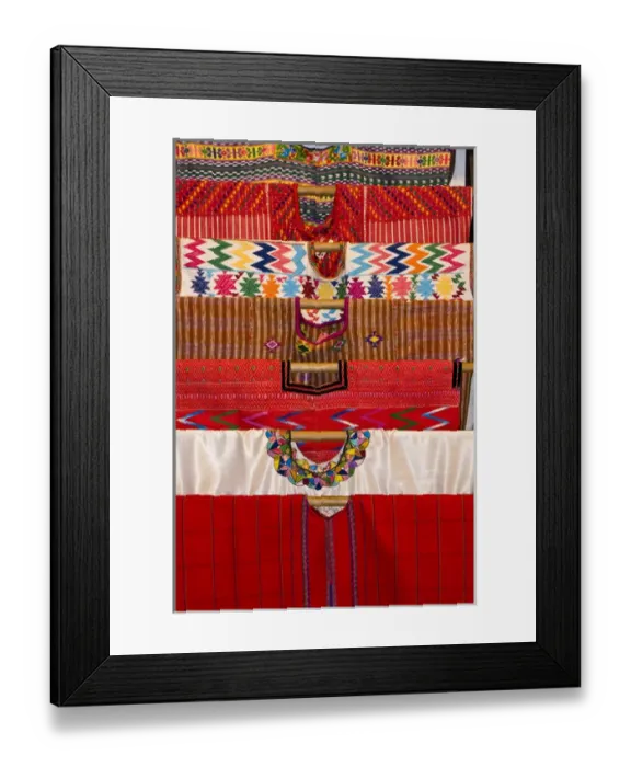 Framed Print : Central America, Guatemala, Antigua. A display of colorful huipils in a shop in Antigua Framed Print : Central America, Guatemala, Antigua. A display of colorful huipils in a shop in Antigua