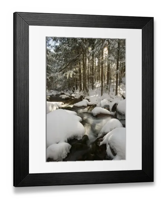 Framed Print : Fresh snow covers the rocks in Wonalancet Brook in New Hampshires White Mountain