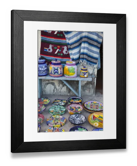 Framed Print : Colorful pottery and blankets for sale in downtown Loreto Mexico