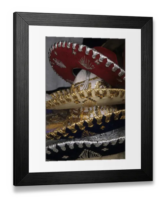 Framed Print : Mexico, Puerta Vallarta. Traditional hats stacked on display