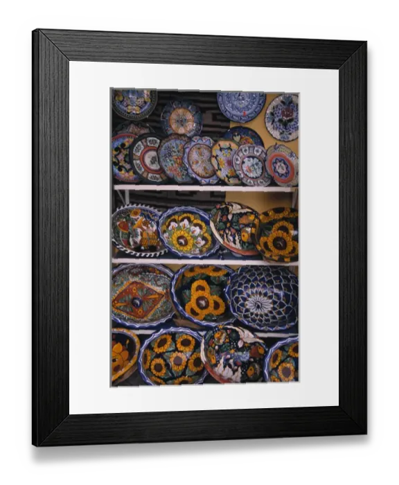 Framed Print : Mexico, Jalisco, Puerta Vallarta. Talevera pottery displayed for sale. Souvenir Framed Print : Mexico, Jalisco, Puerta Vallarta. Talevera pottery displayed for sale. Souvenir