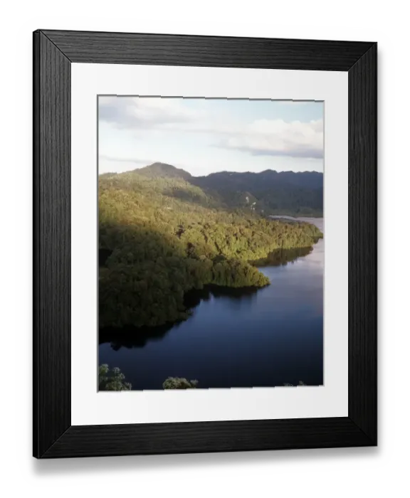 Framed Print : Lake Itsanok uk near Metzabok. At the edge of the lake, in the sacred cave shrines of Metzabok