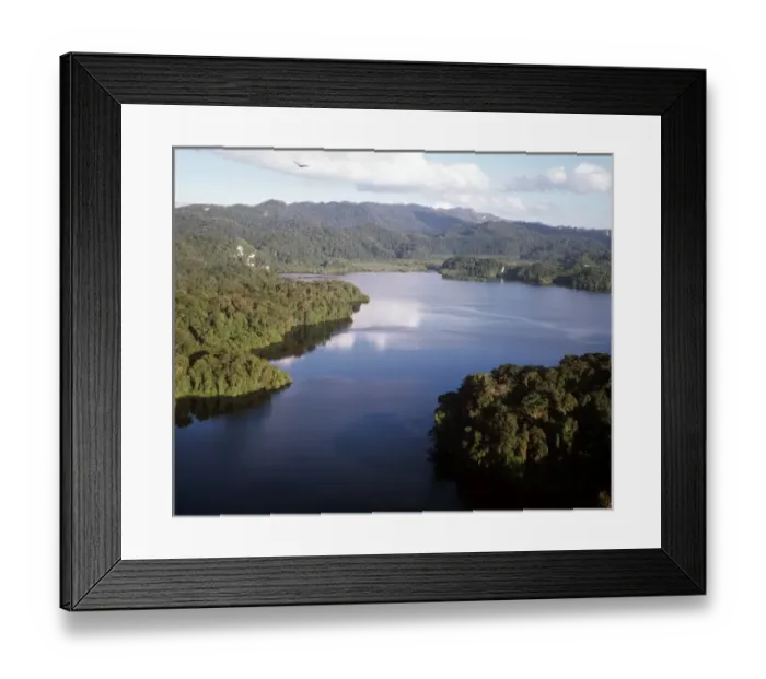 Framed Print : Lake Itsanok uk near Metzabok. At the edge of the lake, in the sacred cave shrines of Metzabok