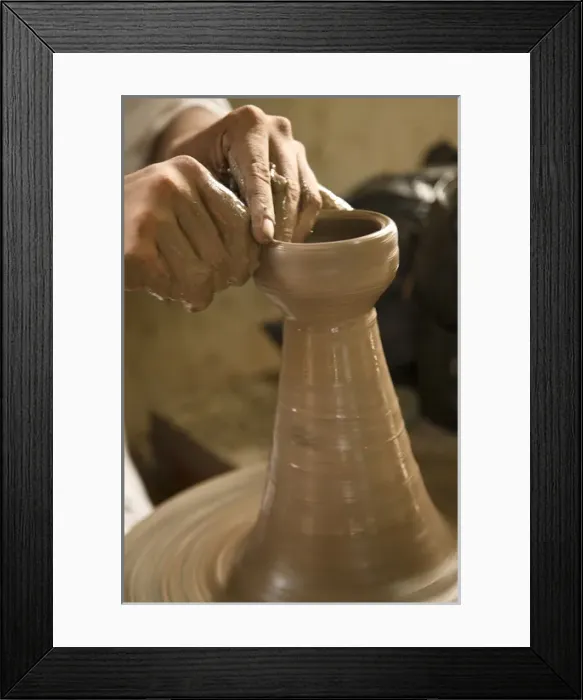 Framed Print : Central America, Nicaragua, Catarina. Potters hands creating clay pottery on spinning wheel